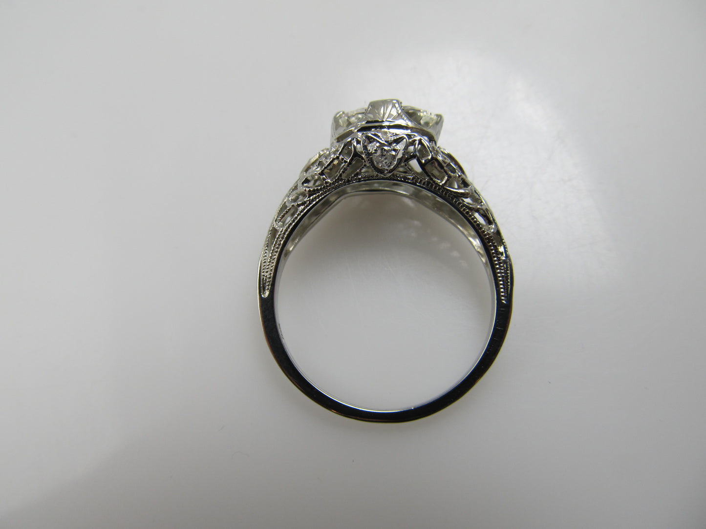 18k White Gold Filigree Ring With A 1.21ct Oval Cut Diamond, Circa 1920