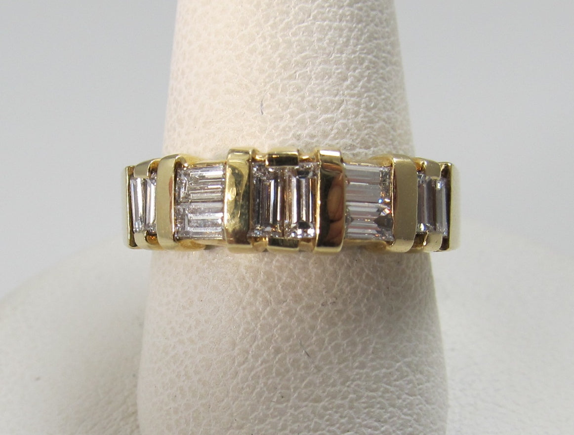 14k yellow gold ring with .70cts in baguette cut diamonds
