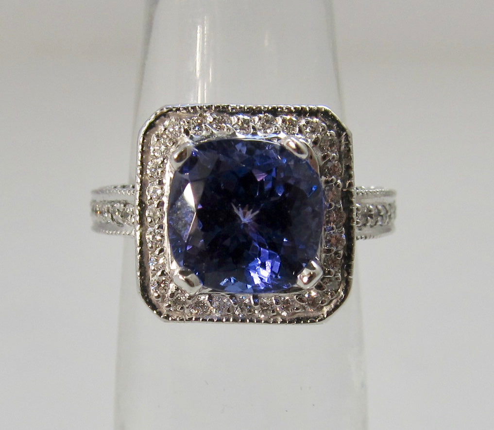2.75ct tanzanite and diamond halo ring