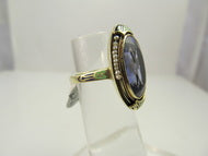 14k yellow gold ring with a synthetic sapphire, pearls and enamel.  Circa 1920.