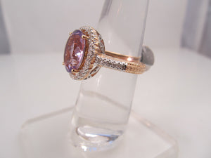 14k rose gold ring with amethyst and .50cts in diamonds