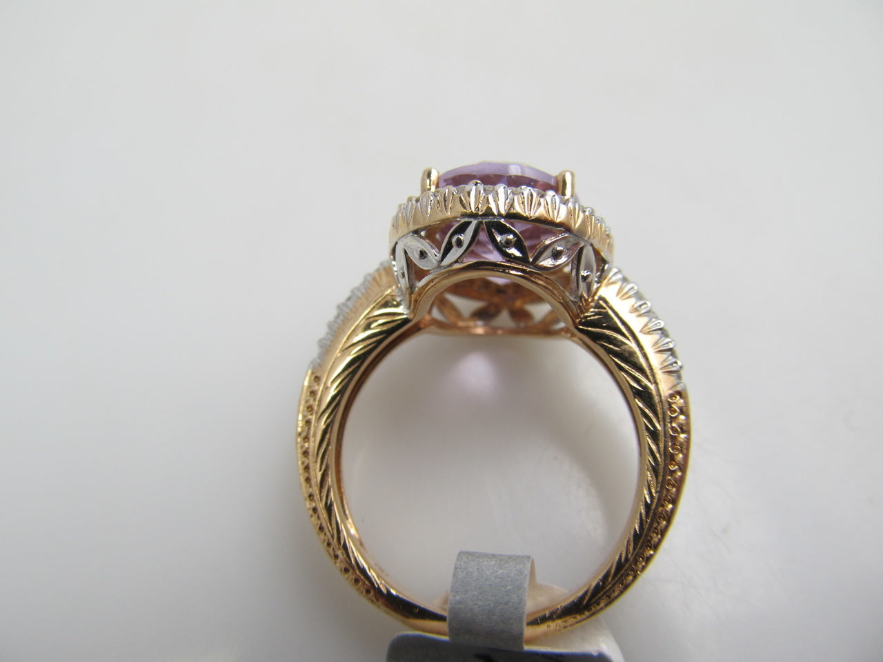 14k rose gold ring with amethyst and .50cts in diamonds
