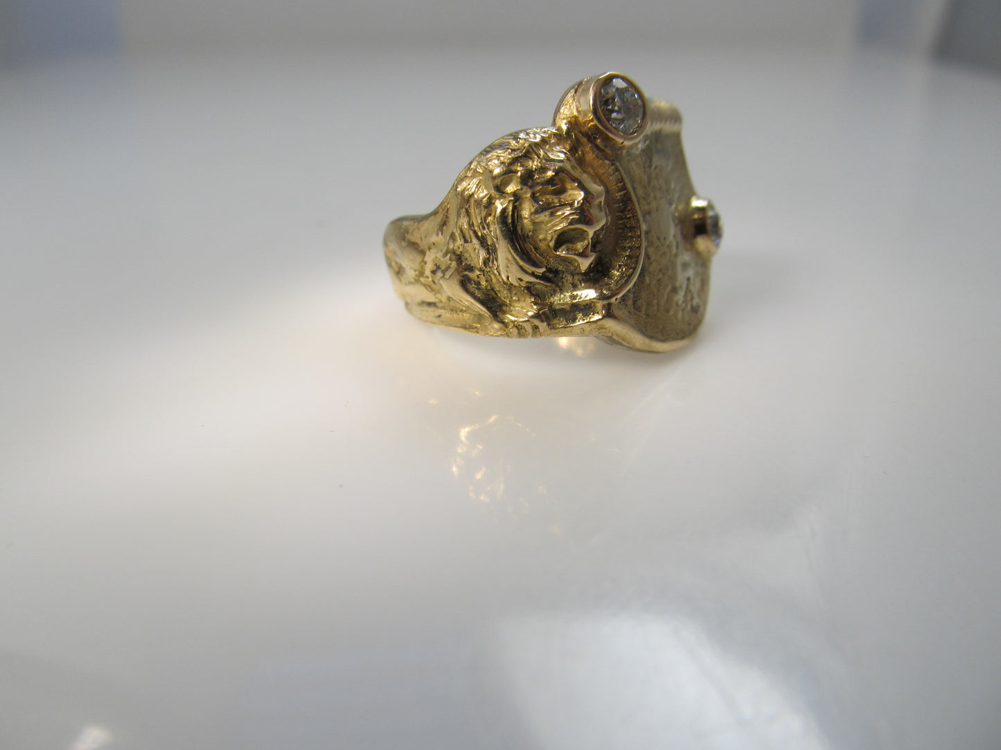Art Nouveau lion signet ring with diamonds
