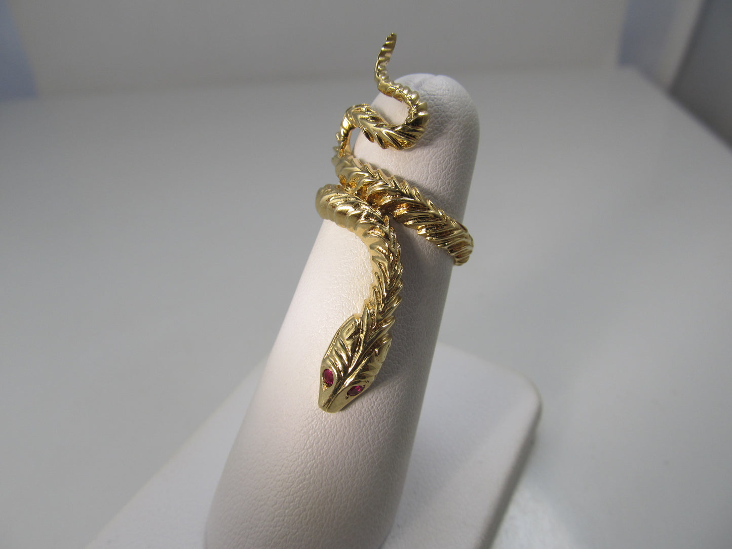 Long vintage snake ring with ruby eyes