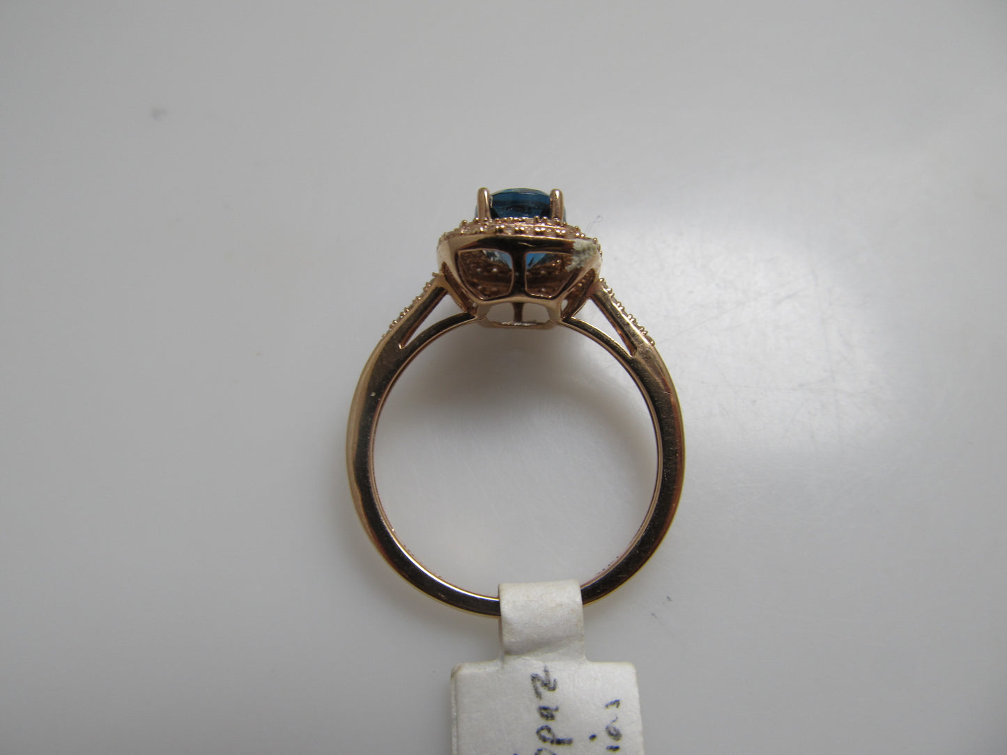 Rose gold blue topaz ring