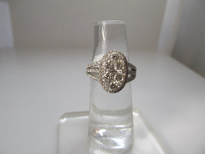 Oval cluster diamond ring