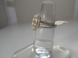 Oval cluster diamond ring