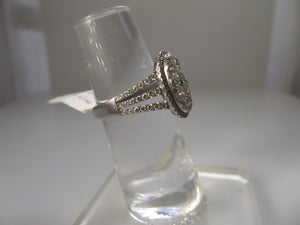Oval cluster diamond ring