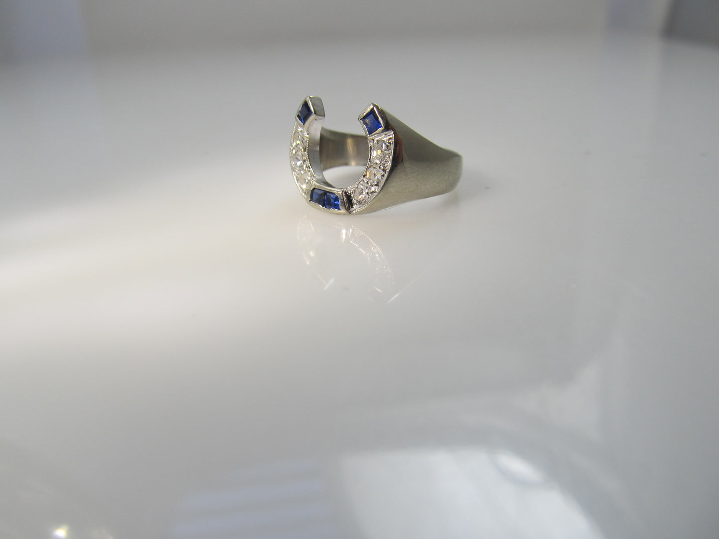 Vintage sapphire and diamond horseshoe ring