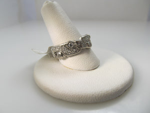 Vintage platinum decorative diamond eternity band