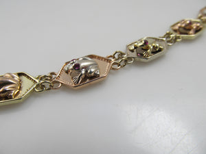 14k white, rose and yellow gold frog bracelet with ruby