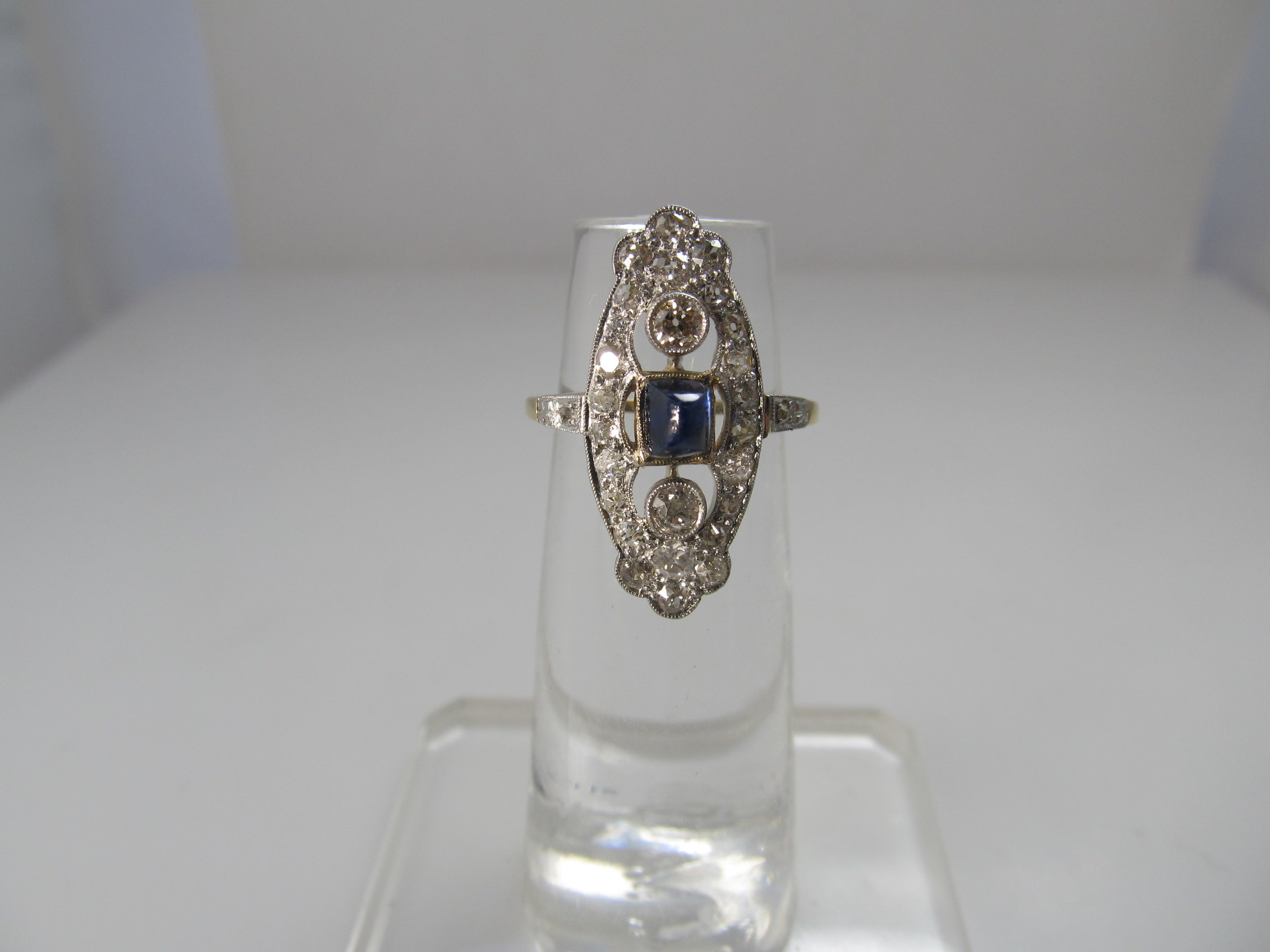 Navette shaped sapphire and diamond ring, 14k and platinum