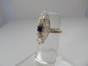 Navette shaped sapphire and diamond ring, 14k and platinum