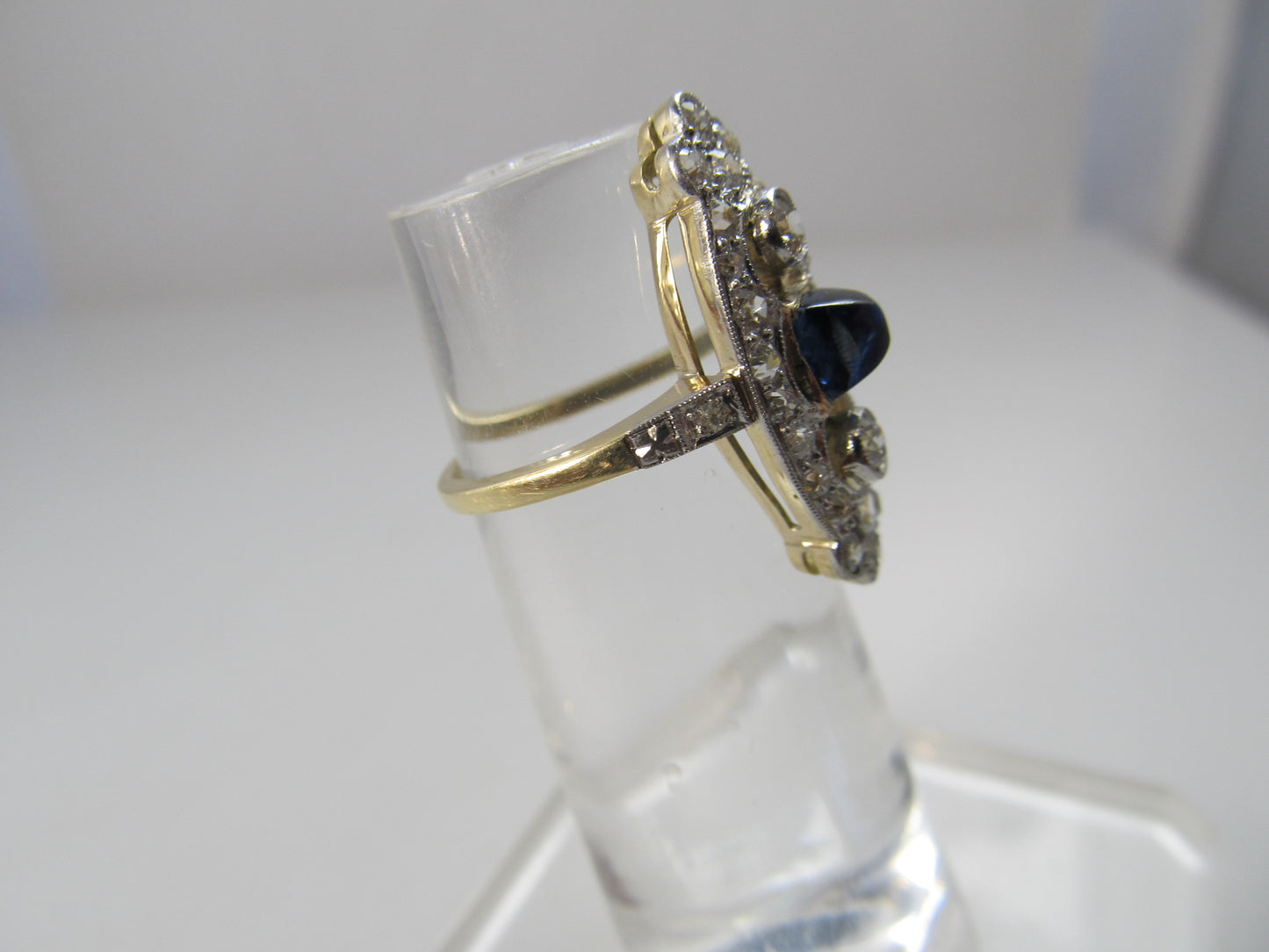 Navette shaped sapphire and diamond ring, 14k and platinum