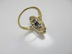 Navette shaped sapphire and diamond ring, 14k and platinum