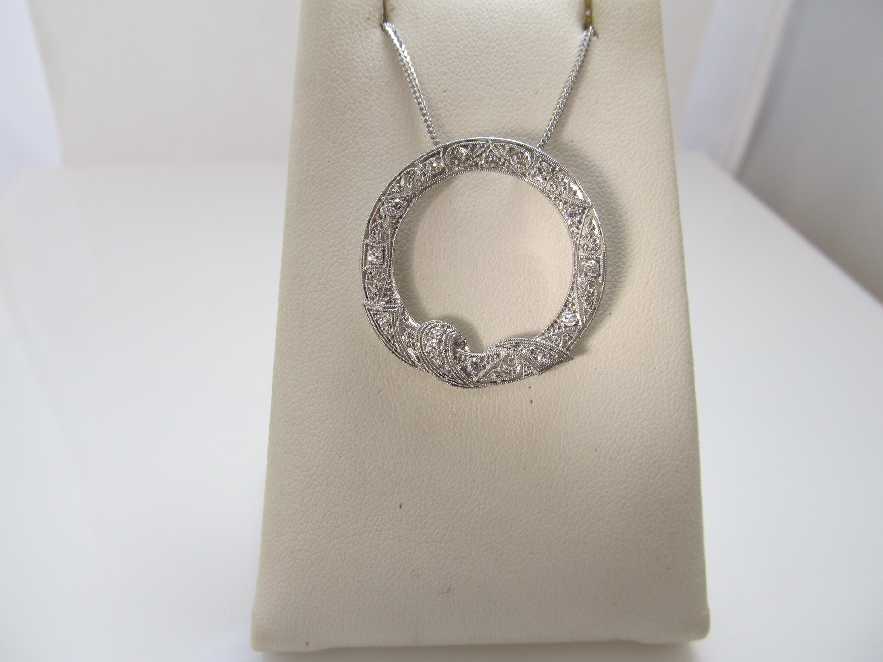 Antique platinum diamond circle necklace