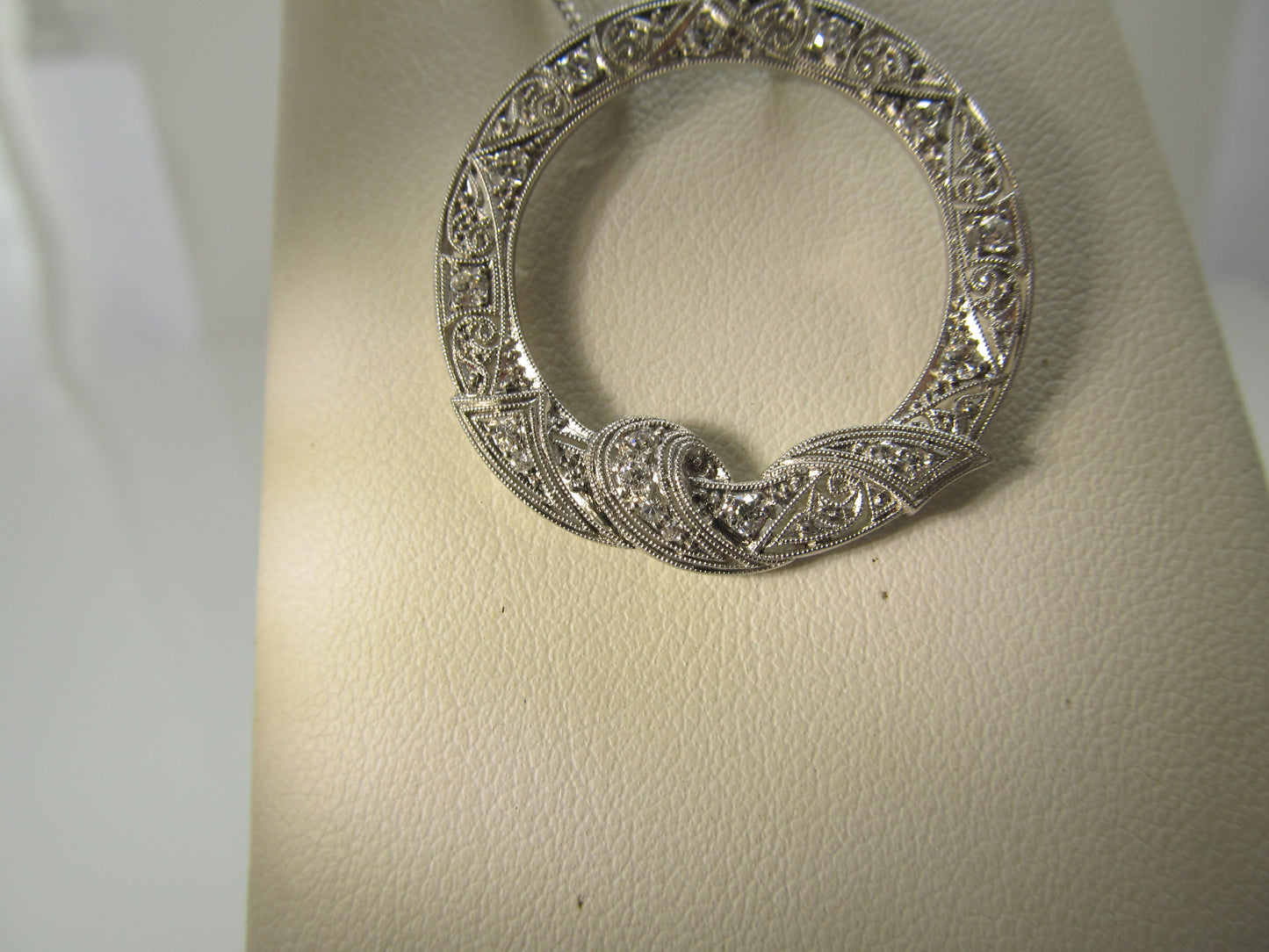 Antique platinum diamond circle necklace