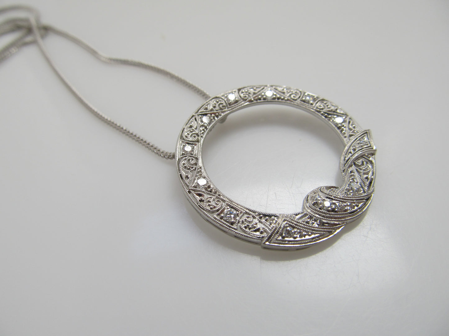 Antique platinum diamond circle necklace