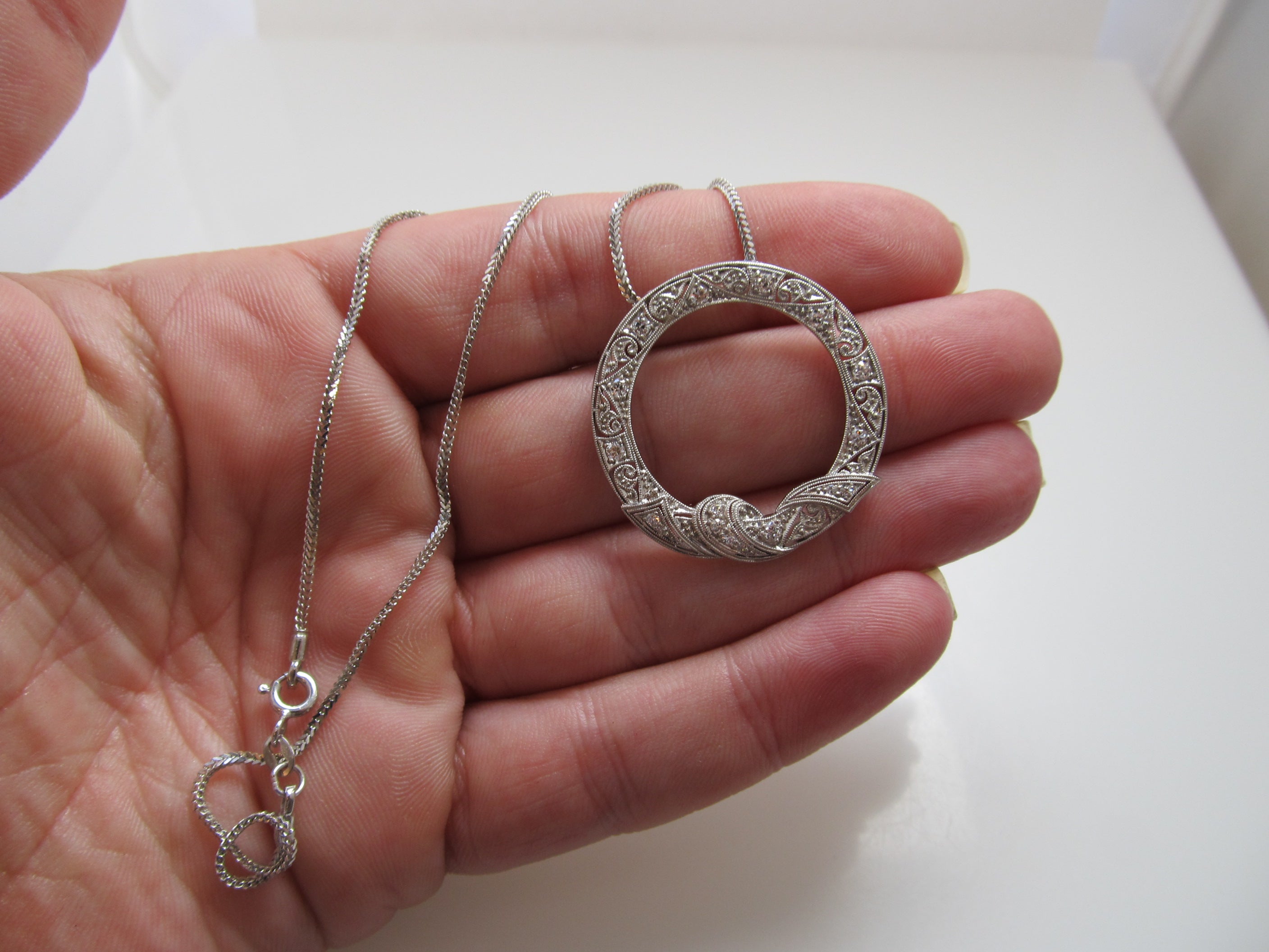 Antique platinum diamond circle necklace