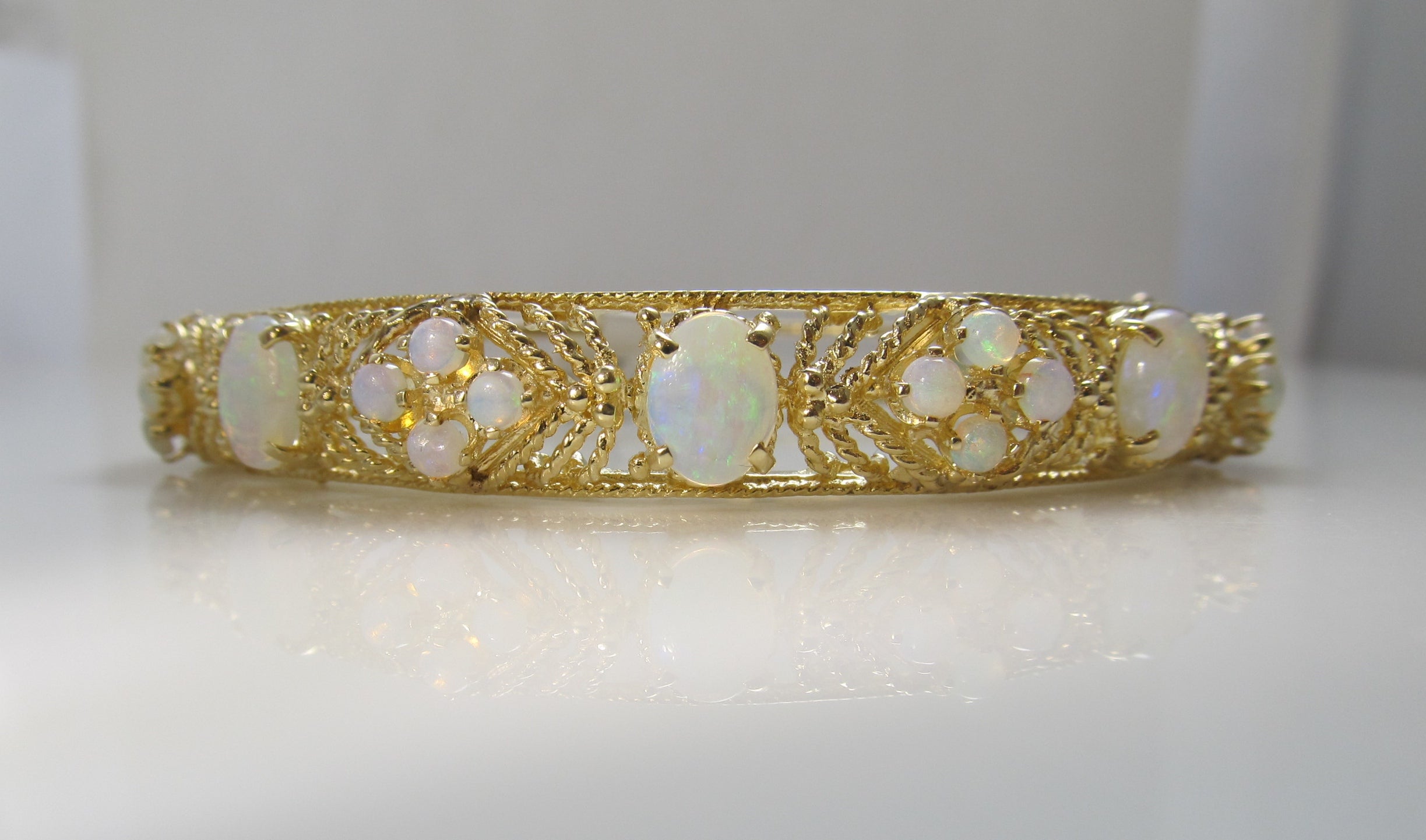 Estate 14k yellow gold 5ct opal bangle bracelet