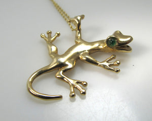 Super cute 14k gold gecko necklace with emerald eyes