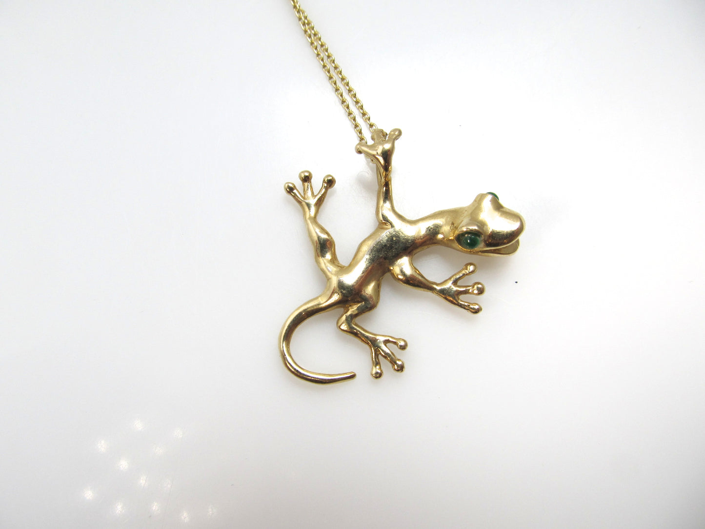 Super cute 14k gold gecko necklace with emerald eyes