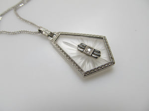 Art Deco camphor glass necklace with a diamond and enamel