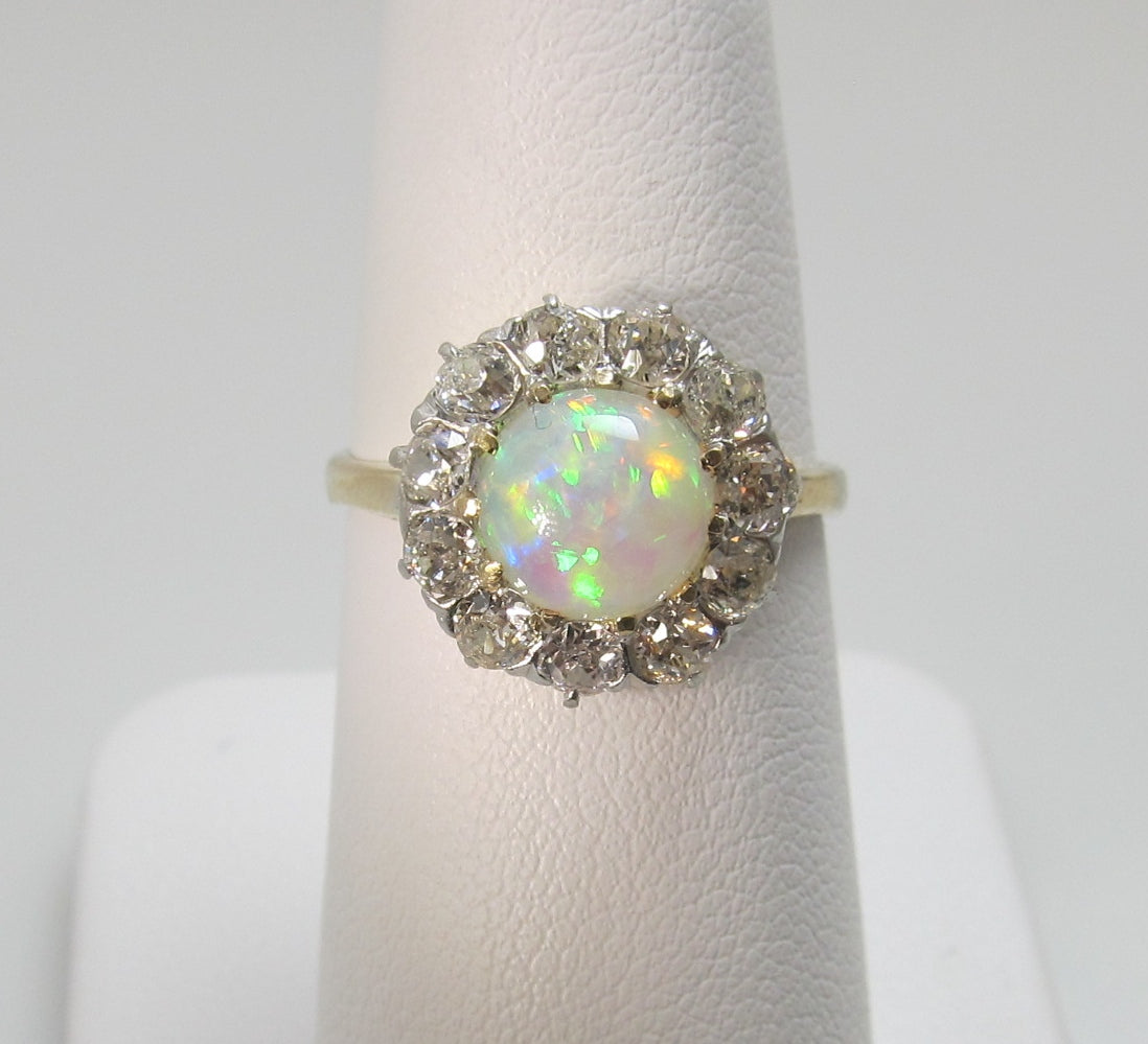 Antique platinum and 14k ring with opal and diamonds