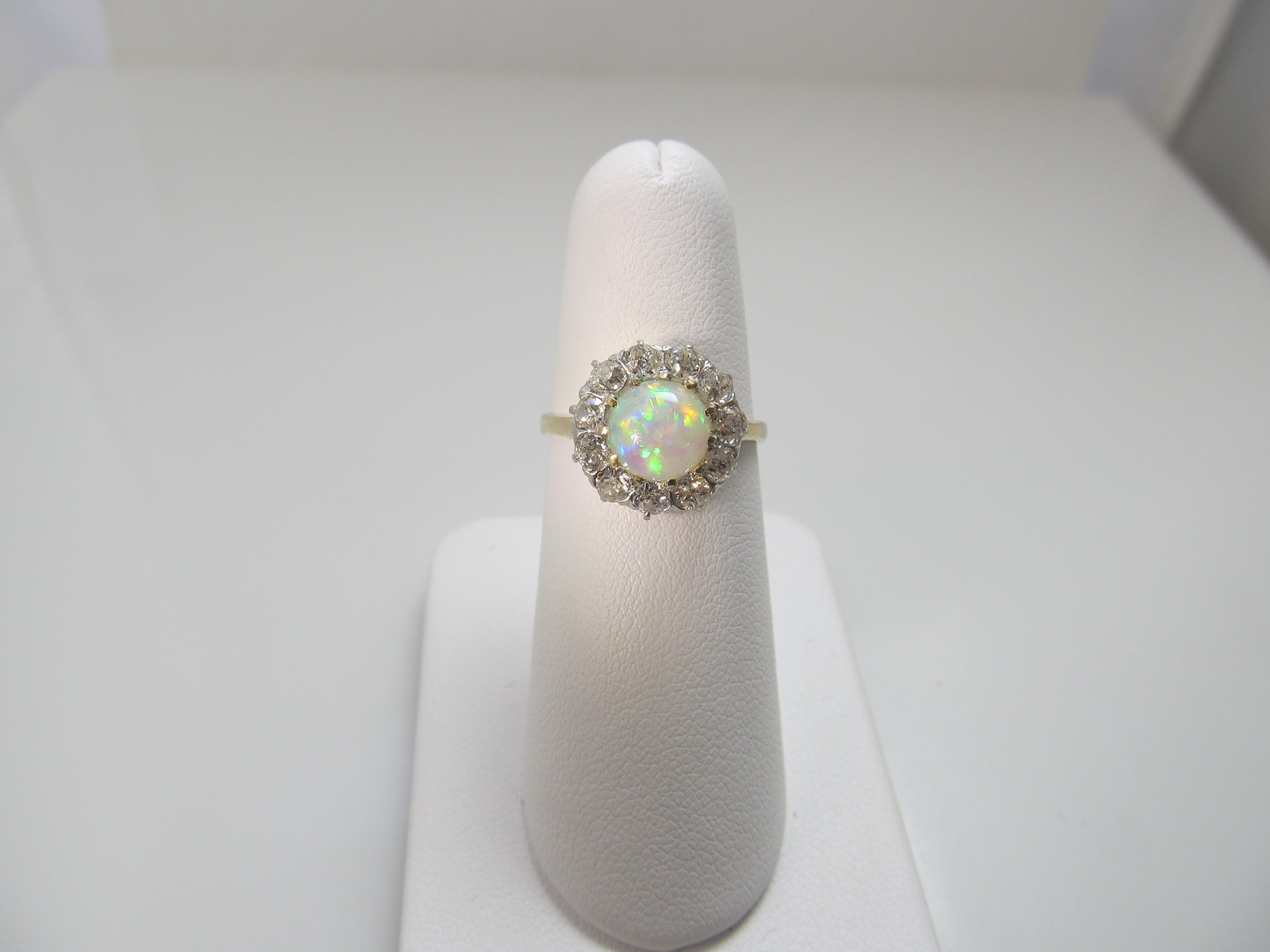 Antique platinum and 14k ring with opal and diamonds