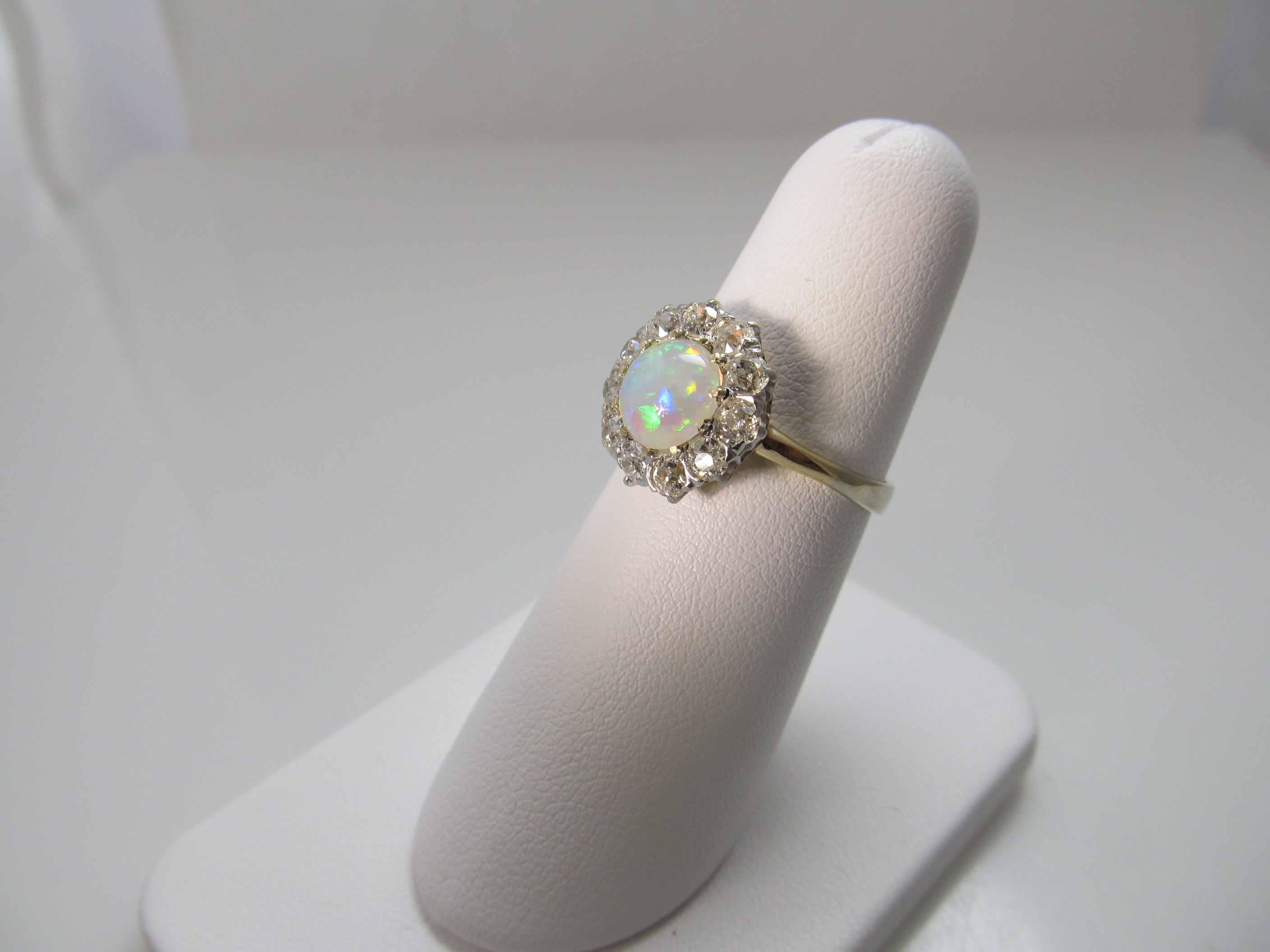 Antique platinum and 14k ring with opal and diamonds