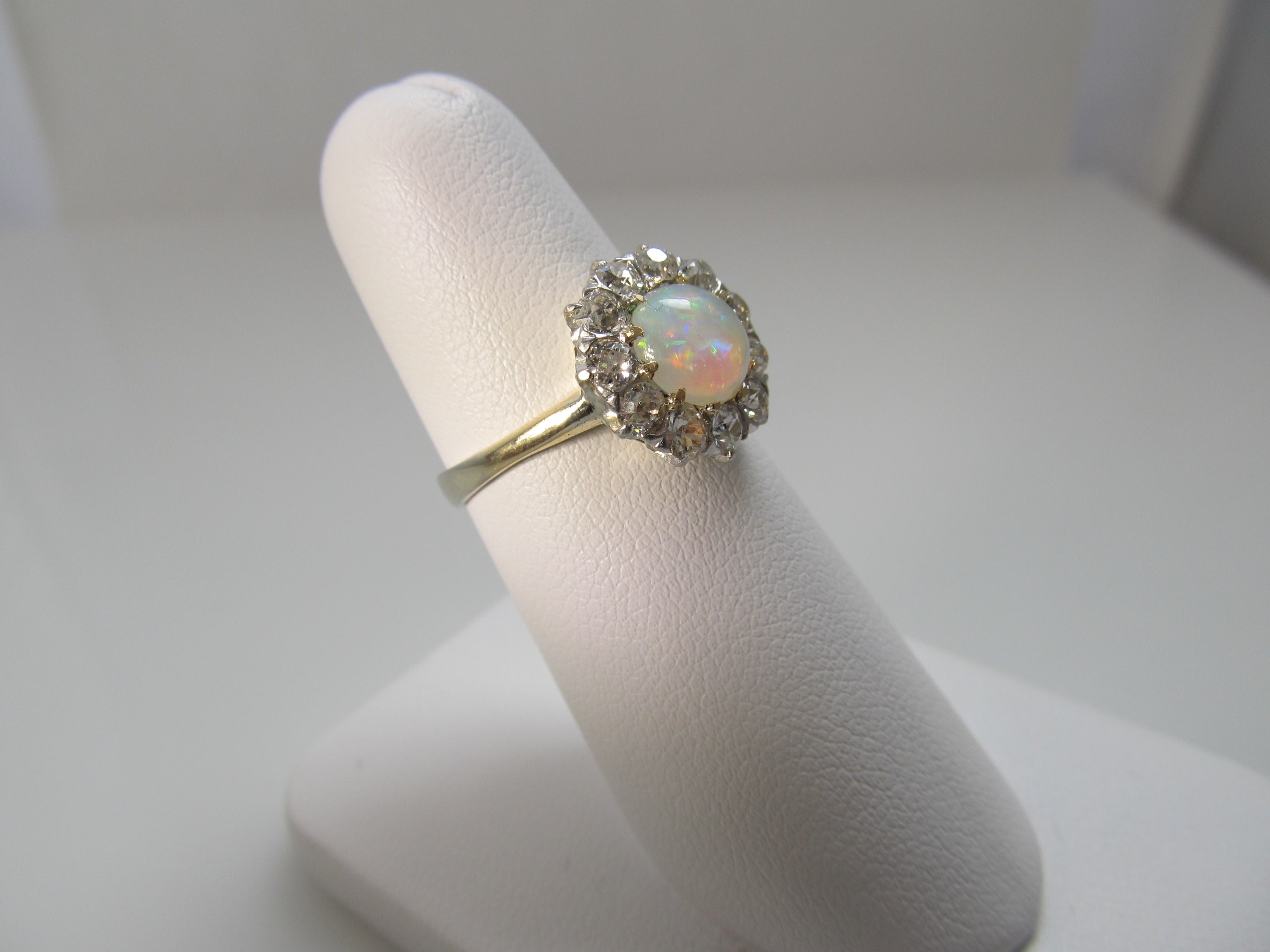 Antique platinum and 14k ring with opal and diamonds