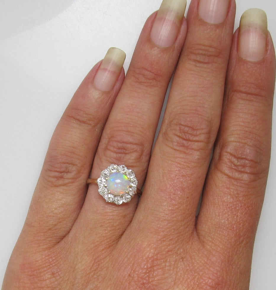 Antique platinum and 14k ring with opal and diamonds