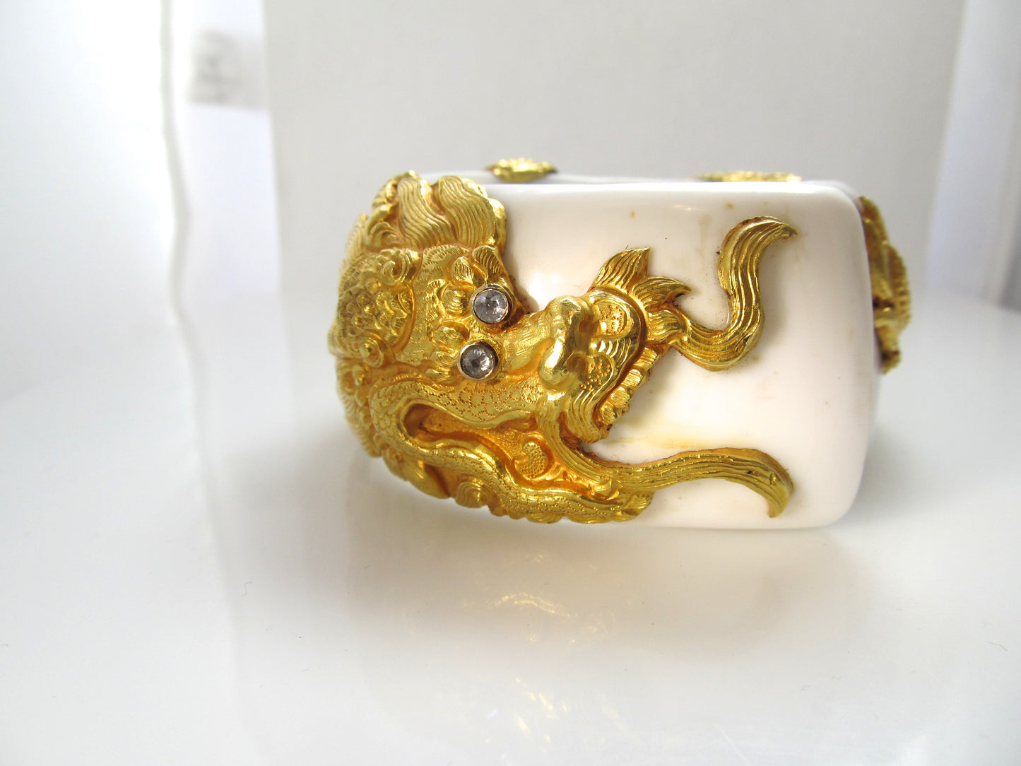 HUGE!  22k yellow gold dragon bracelet on shell with diamonds