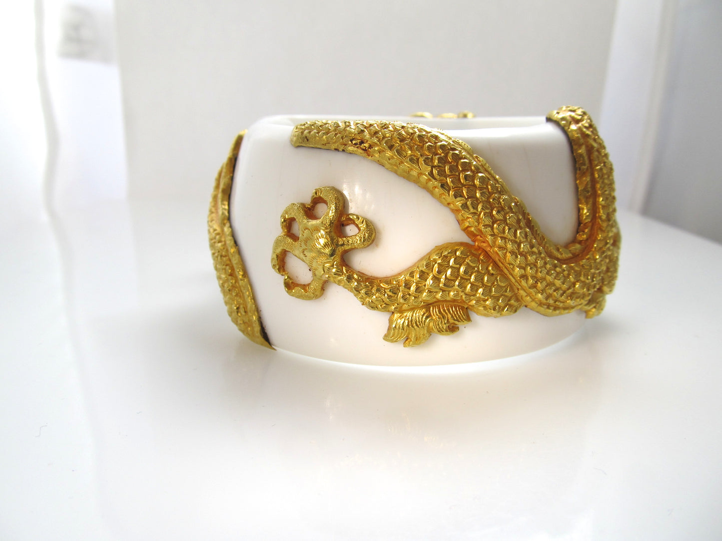 HUGE!  22k yellow gold dragon bracelet on shell with diamonds