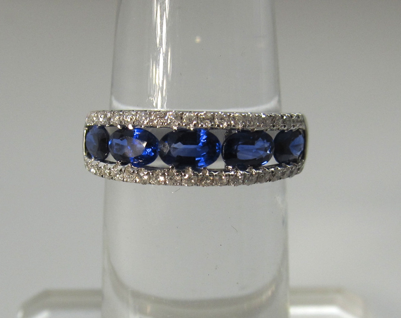 Bright blue sapphire diamond band, 18k white gold