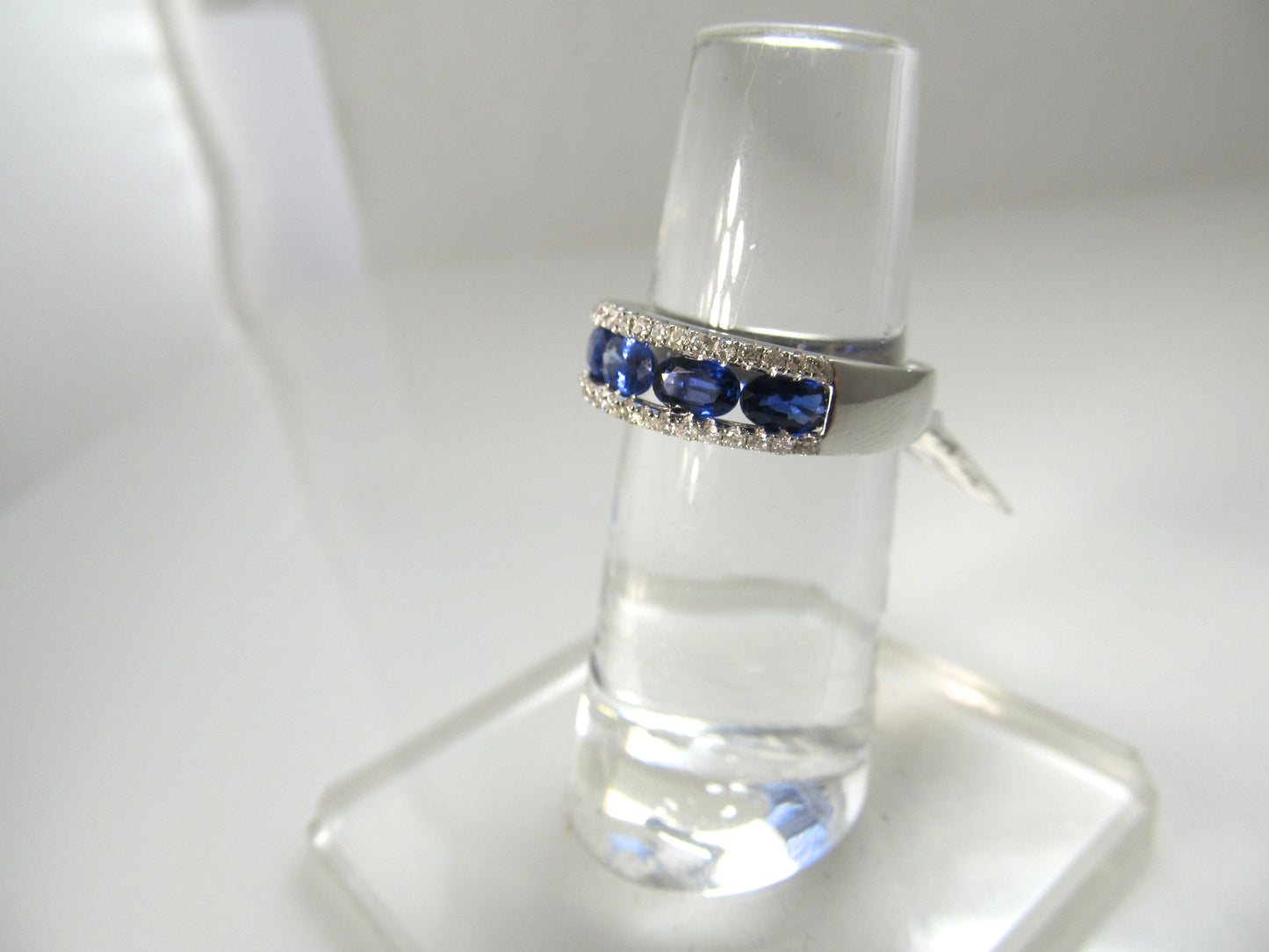 Bright blue sapphire diamond band, 18k white gold