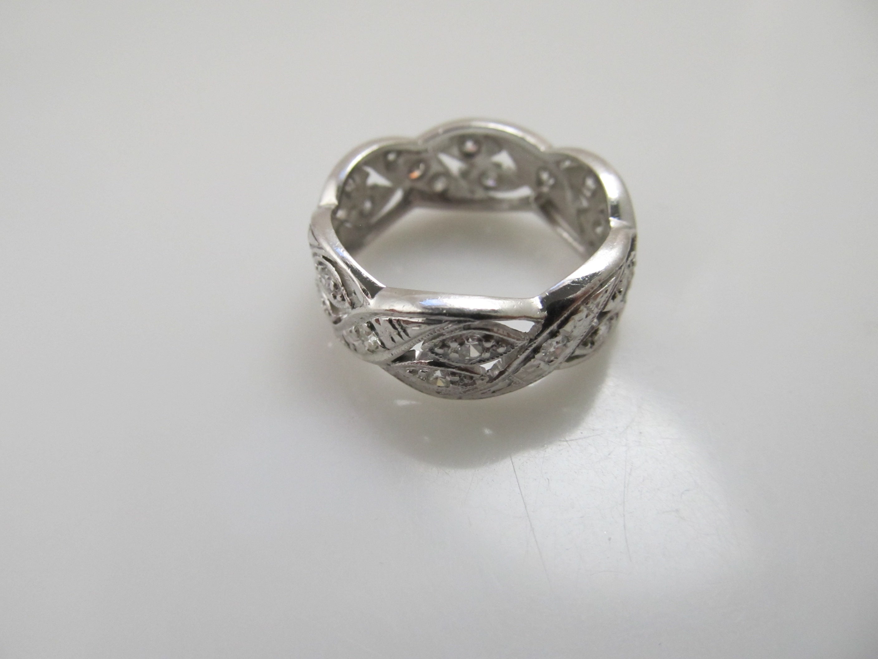 Wide vintage platinum diamond eternity band