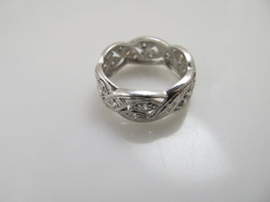 Wide vintage platinum diamond eternity band