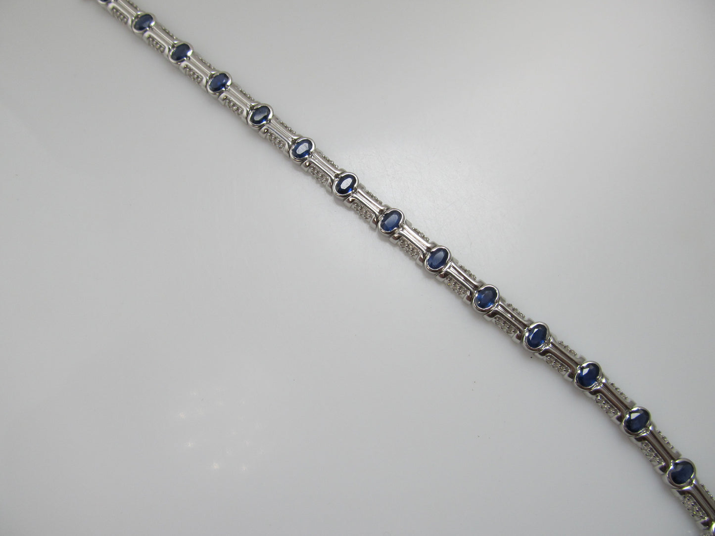 Modern 14k white gold sapphire diamond bracelet