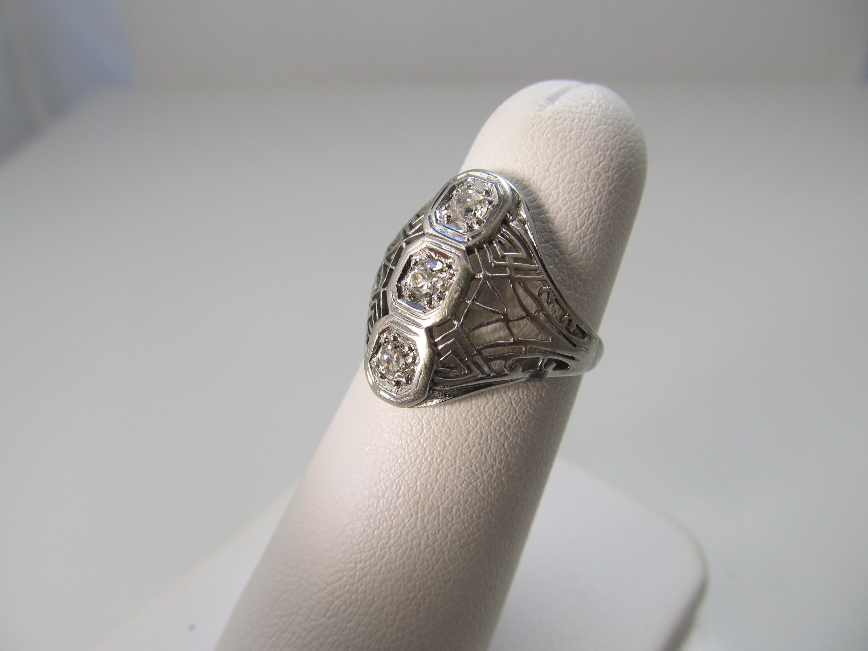 Antique white gold filigree diamond ring