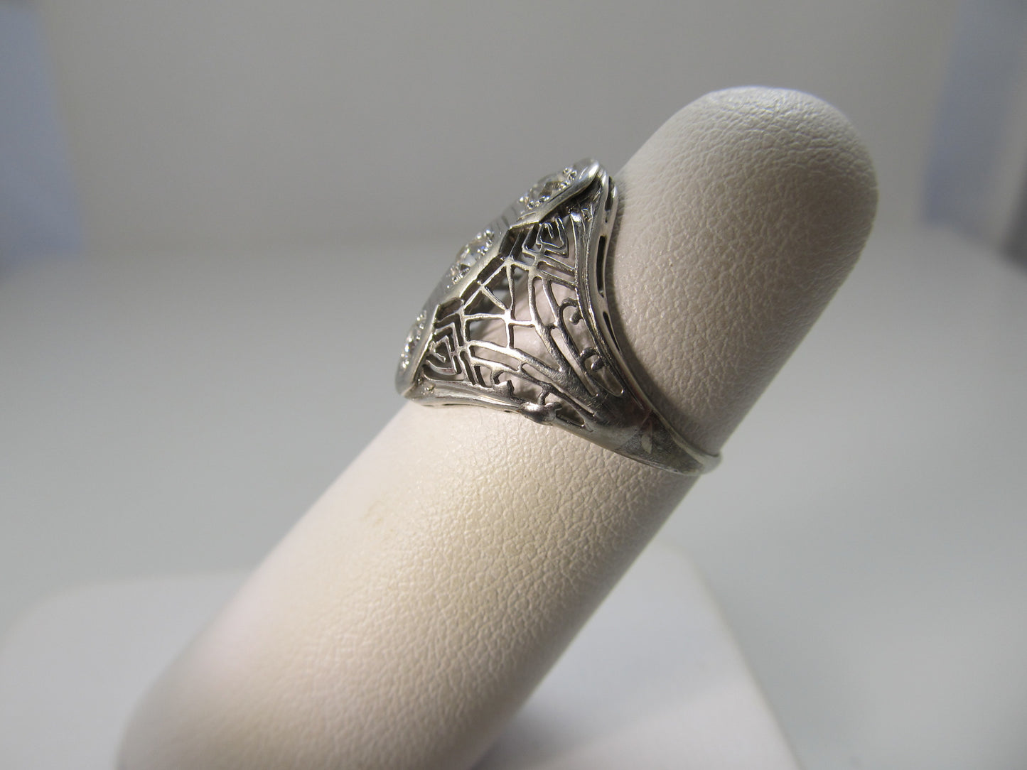 Antique white gold filigree diamond ring
