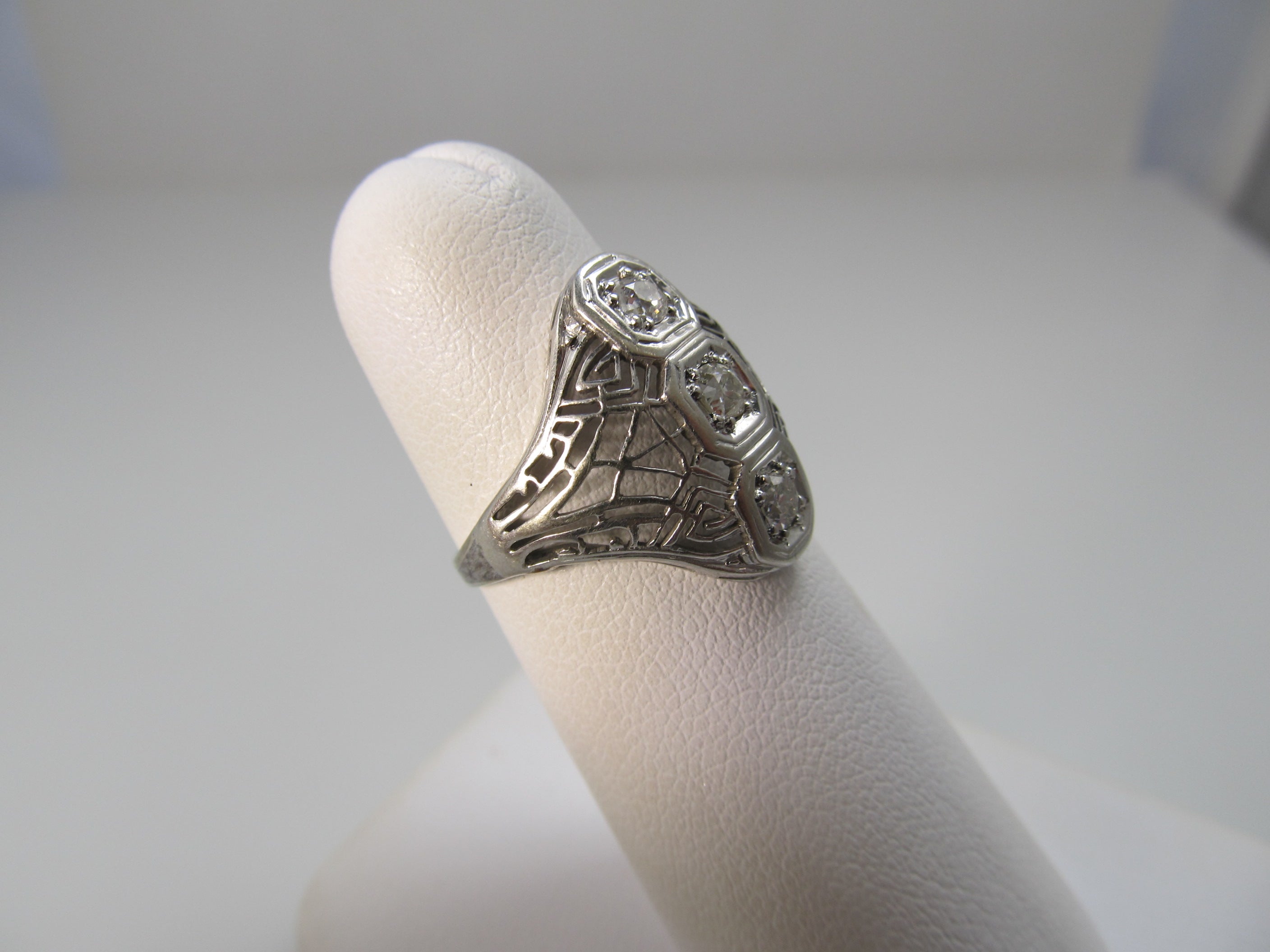 Antique white gold filigree diamond ring