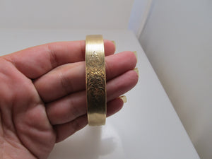 Vintage 14k gold engraved bangle bracelet