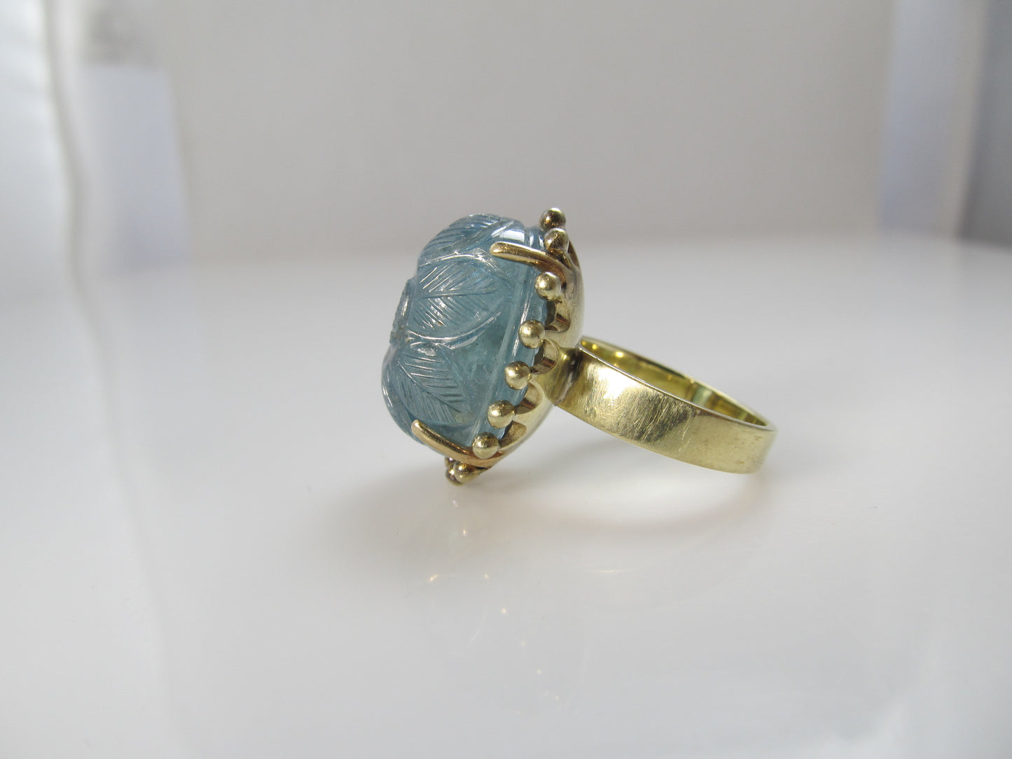20.00ct carved aquamarine ring in 14k yellow gold