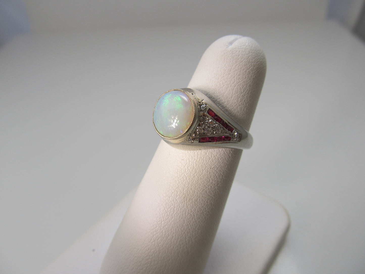 Vintage platinum opal, ruby and diamond ring