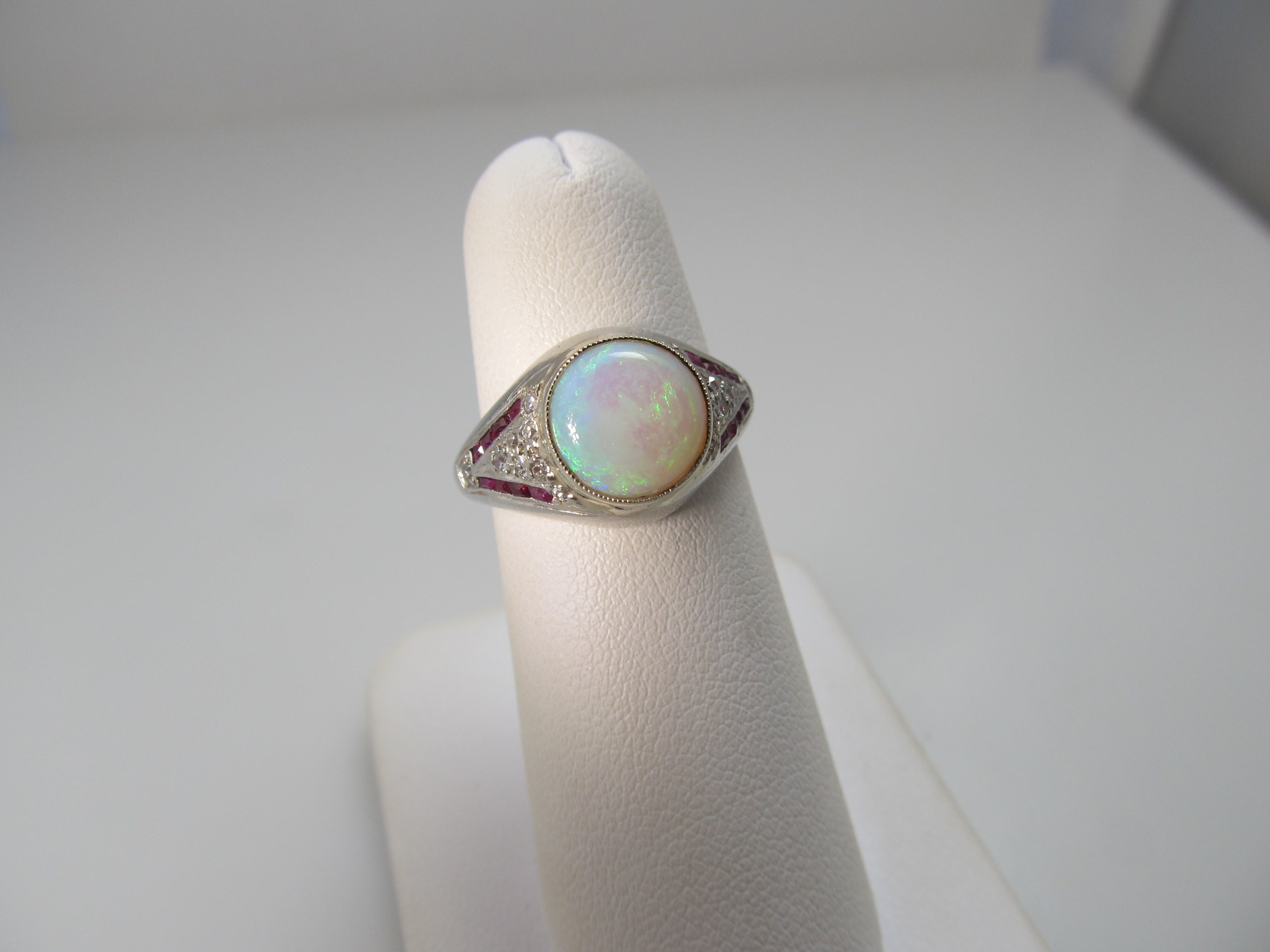 Vintage platinum opal, ruby and diamond ring