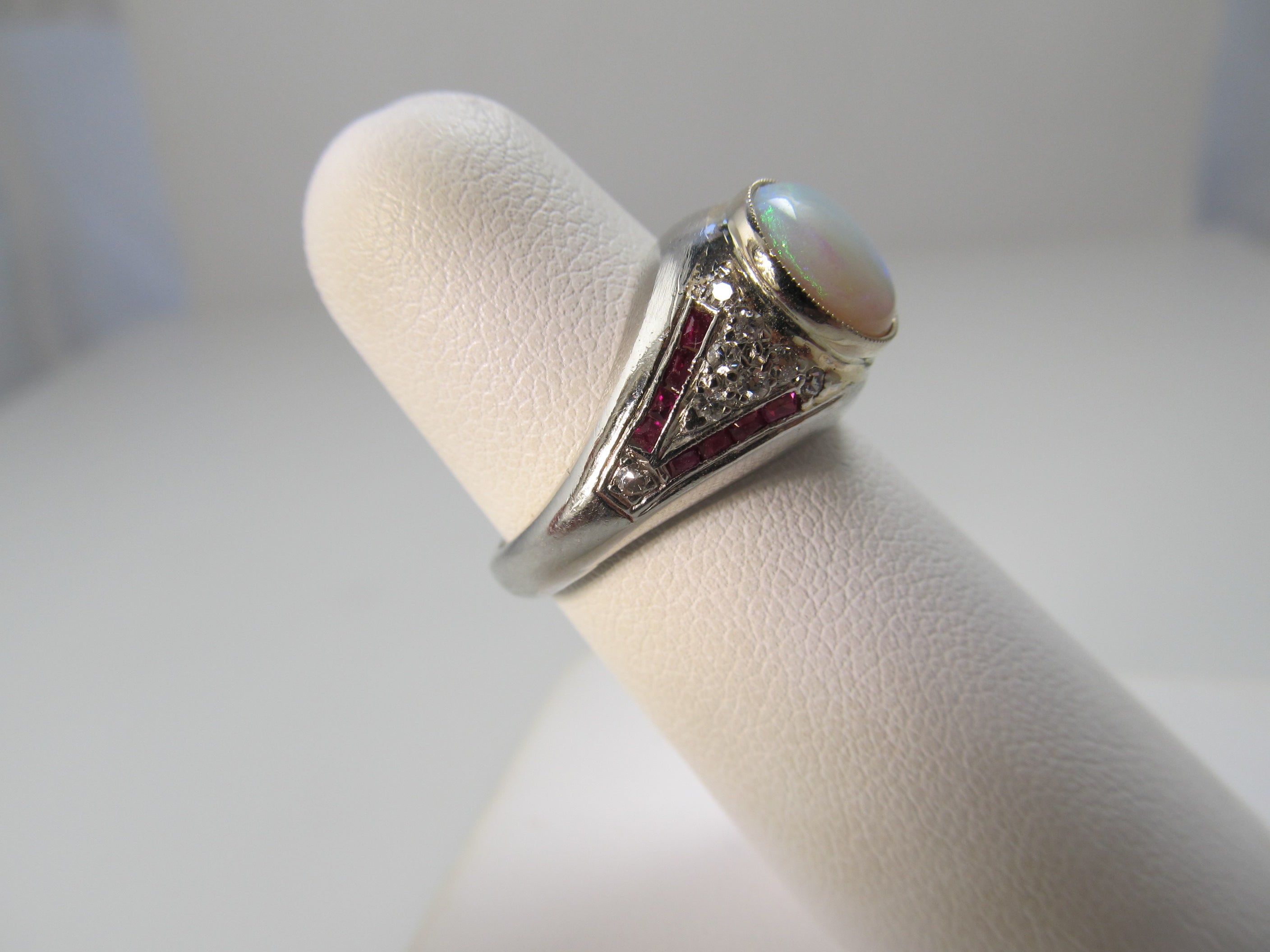 Vintage platinum opal, ruby and diamond ring