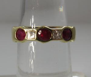 Fine 18k yellow gold ruby and diamond band