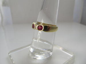 Fine 18k yellow gold ruby and diamond band