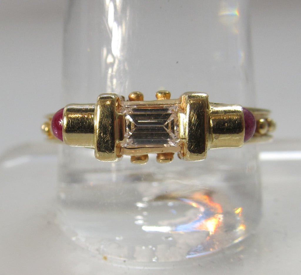 14k .25ct emerald cut diamond and ruby ring